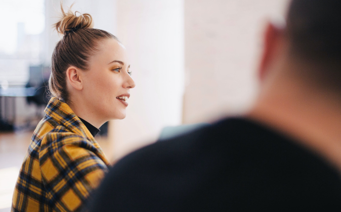 woman speaking in a meeting