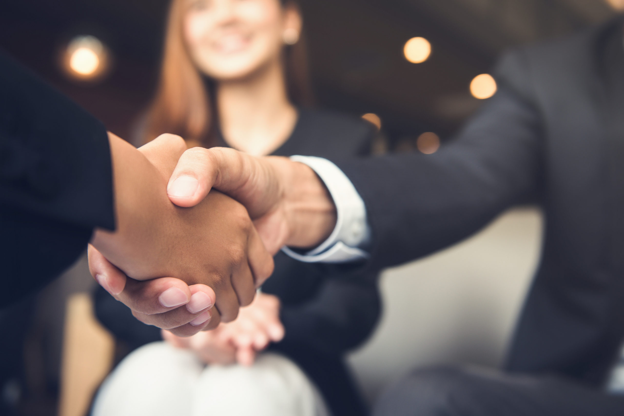 two people shaking hands