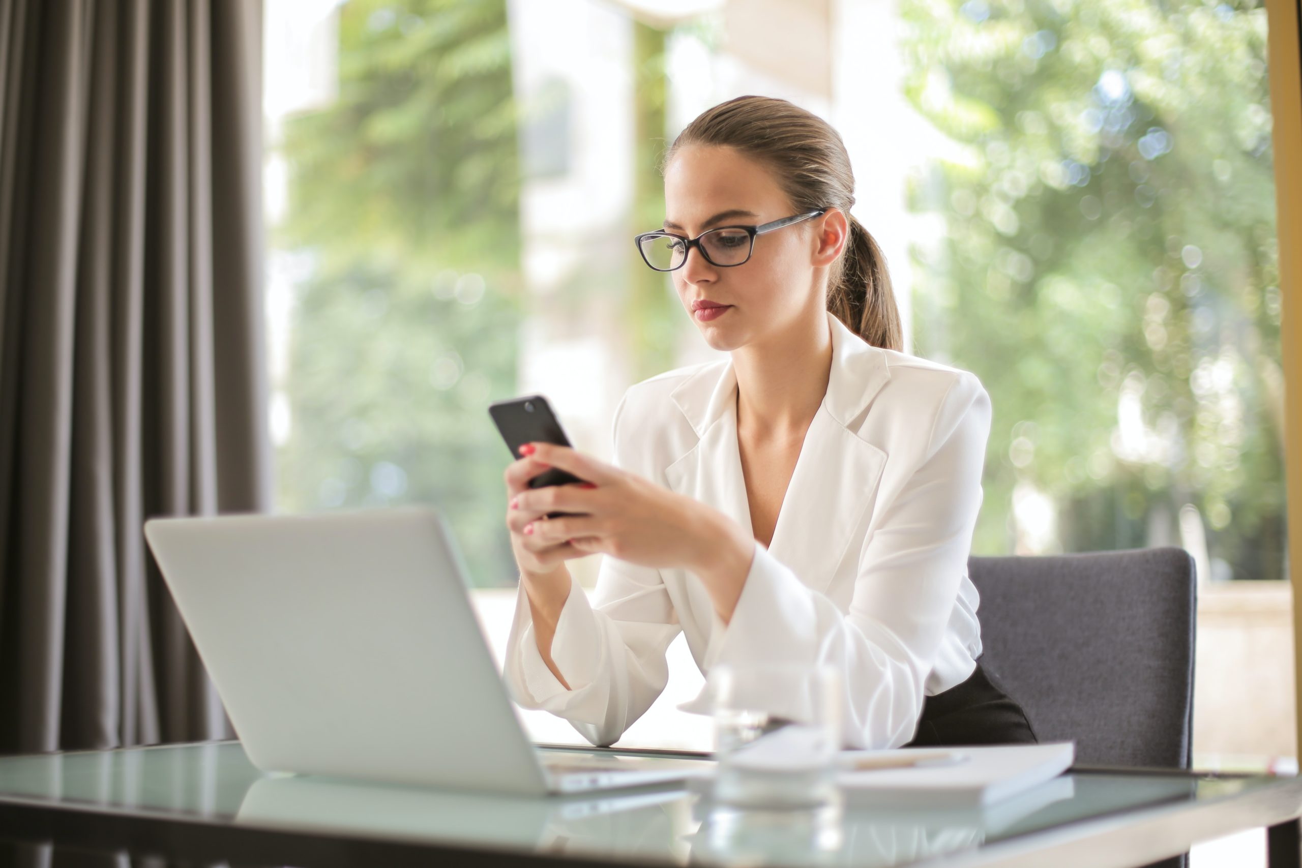 woman texting on phone