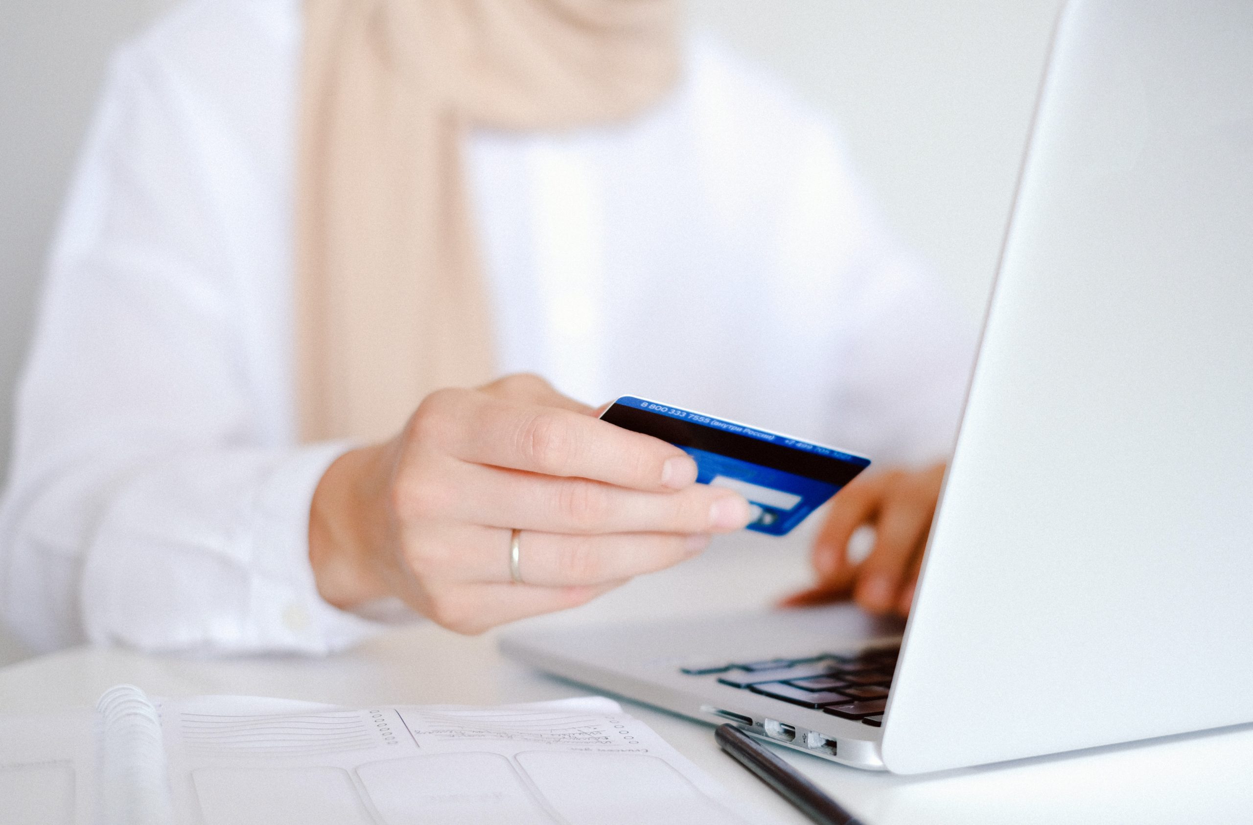 woman holding a credit card