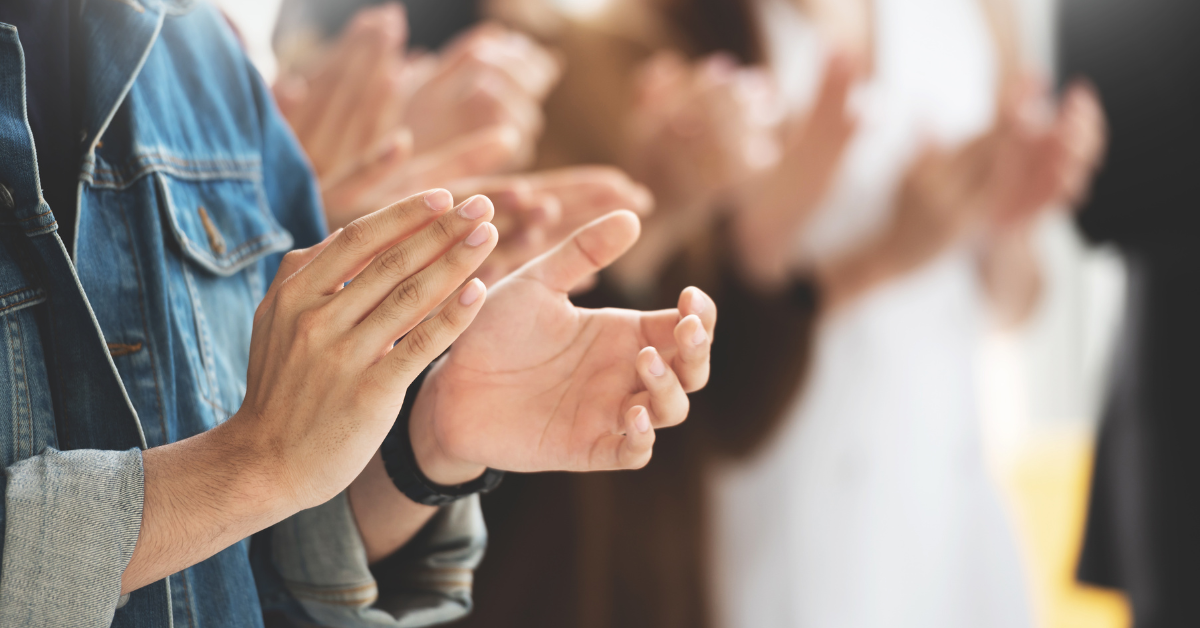 partnership award shortlisting - image of audience clapping their hands.